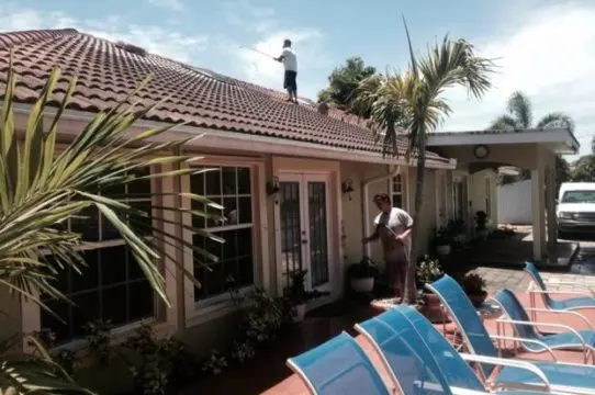 Wall Cleaning Services in Wellington, FL Professional exterior wall cleaning service in Wellington, FL removing mold, mildew, and dirt